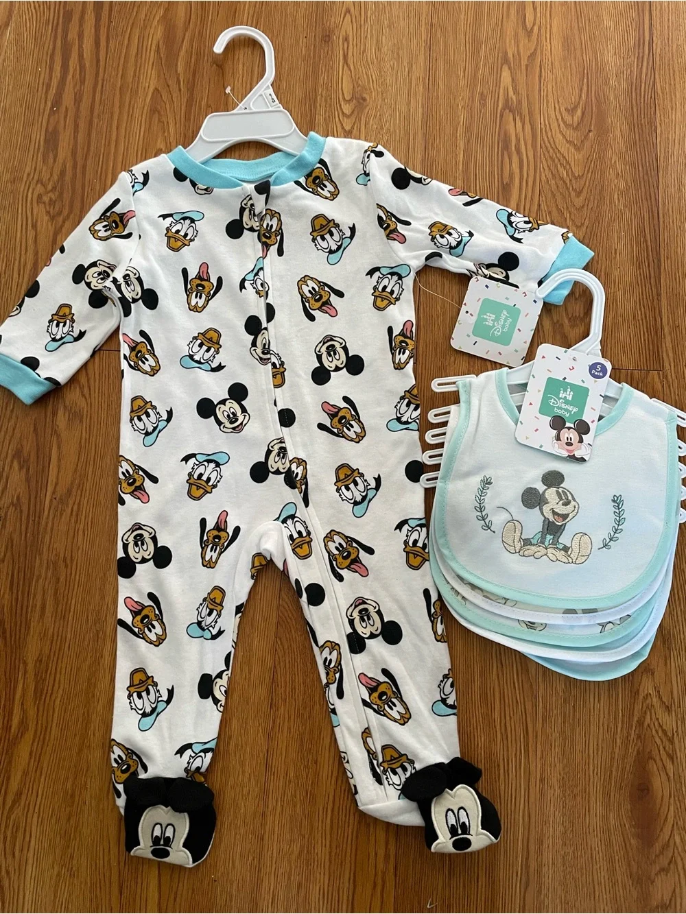 Disney baby footed sleeper and matching bibs